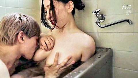 Ai Sayama nude in steamy bathtub, lover sucking her breasts intimately