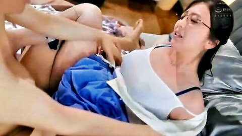 Asian teacher in glasses succumbs to student's intimate touch on bed