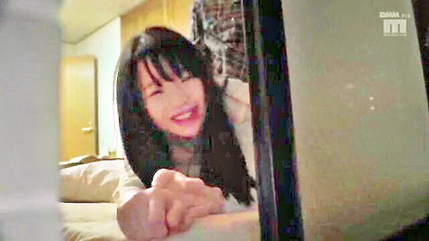 Petite Japanese teen smiles excitedly as rough hand grips her face hard in intense taboo scene