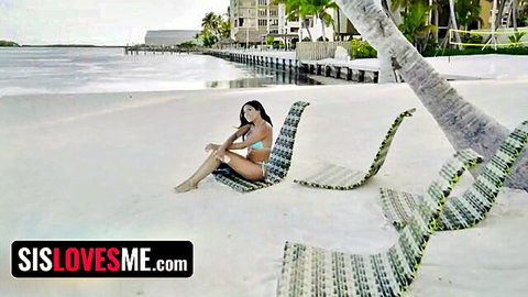 Curvy olive-skinned Latina in tiny bikini teasing on sunny beach chair