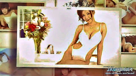 Japanese woman with juicy big boobs posing in white bikini swimsuit