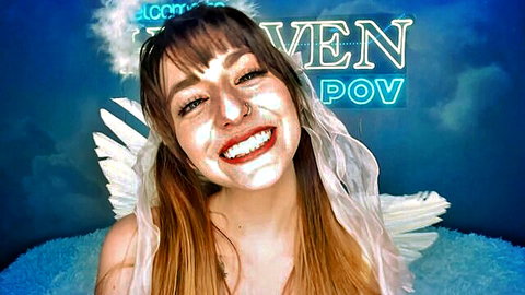 Petite fair teen angel in POV smiling with wings heavy makeup and heaven neon background
