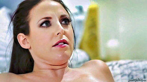 Angela White topless with large breasts, surprised expression