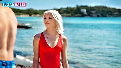 Malisa Moir (Lisa Rose) in red swimsuit on sunny beach with man