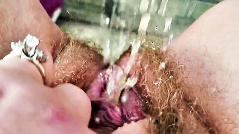 Amateur woman peeing on front porch close-up, getting caught in explicit watersports scene
