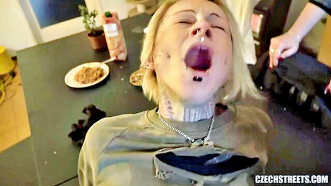 Blonde Czech woman gagging in intense oral scene, mouth wide open