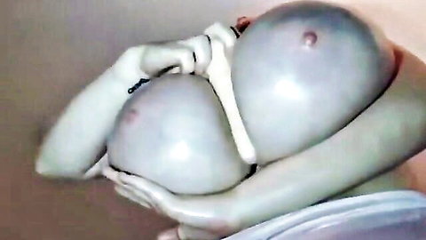 Woman with massive pendulous big boobs in intimate solo close-up