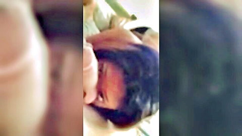Asian woman with dark hair giving close-up POV blowjob