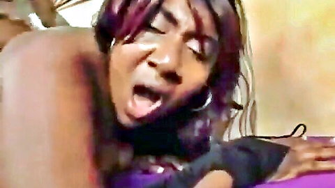 Horny ebony SSBBW moaning in purple lingerie, ecstatic expression