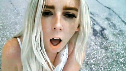 Petite blonde in white lingerie with open mouth, teasing expression