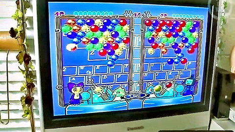 Retro bubble puzzle game on CRT TV, Annabell Lee and Celine context
