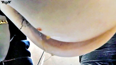 Pale-skinned woman bent over with exposed ass and dripping creampie in JAV close-up