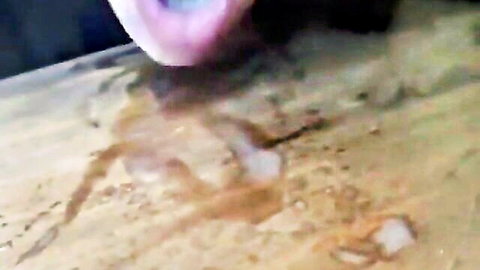 Lactating woman squirting milk from big tits onto cereal table