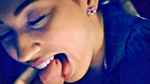 Brunette teen sticks tongue out licking hard cock tip in closeup amateur blowjob