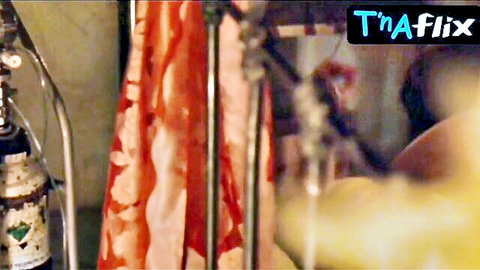 Emma Booth topless breasts scene in Pelican Blood movie