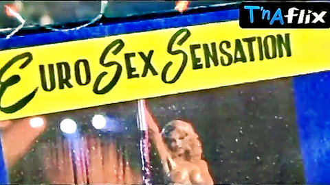 Simone Satin wet breasts on pole in Euro Sex Sensation