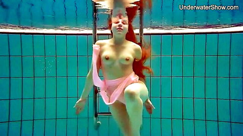 Simonna redhead nude underwater, pink drape, sexy swimming pose