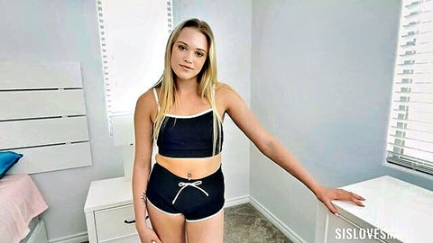Blonde model Chloe Rose posing in black crop top and shorts, teasing stepsis vibe