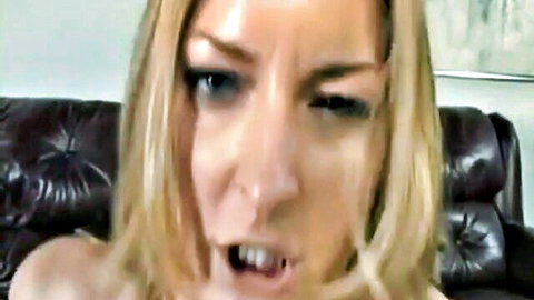Avy Scott blonde MILF with intense open-mouth expression in hot adult scene