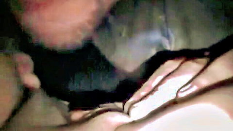 Close-up of man fingering woman in dim light, hotwife pickup scene