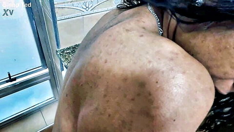 Jasmine Santanna bare back and shoulders in bathroom tease