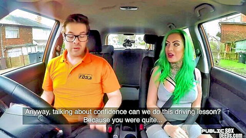 Green-haired babe chats confidence with driving tutor in car lesson