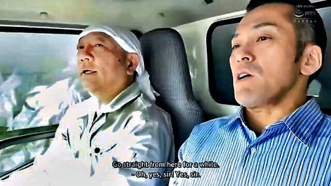 Two Asian men in car conversation, mature and younger in JAV adultery drama