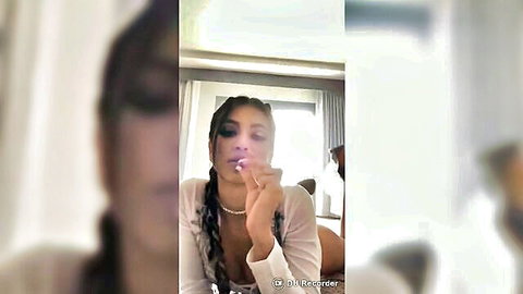 Veronica Rodriguez seductive smoke in low-cut white top