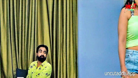 UncutAdda model Anjane in sexy green crop top and jeans posing with bearded Indian man