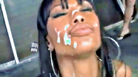 Ebony babe with thick cum facial dripping on her nose lips and cheeks