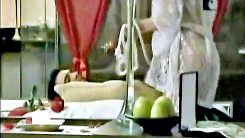 Woman in white lingerie bends over naked man for steamy oral action