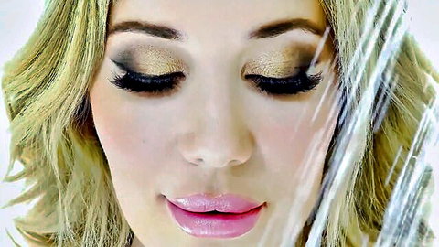 Savannah Bond's seductive blonde close-up with smoky eyes and glossy lips