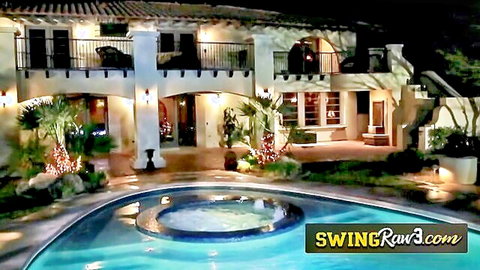 Nighttime luxury poolside mansion for swinger orgy climax