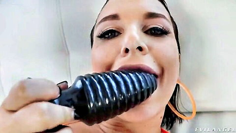 Ivy LeBelle teasing with ribbed dildo in mouth, anal star closeup